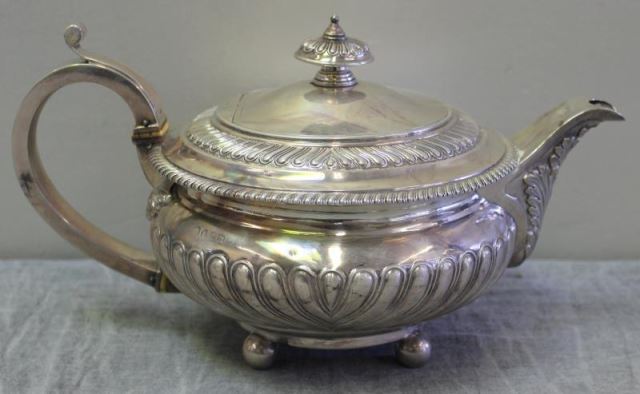 Appraisal: STERLING Antique English Footed Teapot With London hallmarks a date