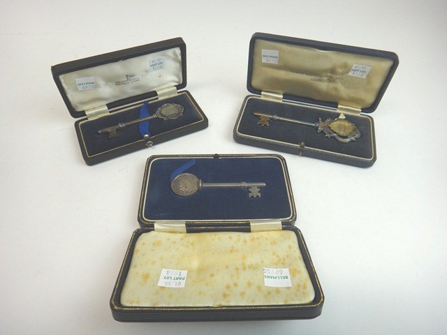 Appraisal: A silver and gilt presentation key detailed Ashville College Science