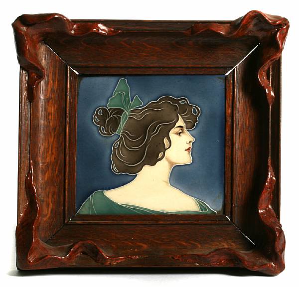 Appraisal: A Continental Art Nouveau glazed earthenware portrait tile early th