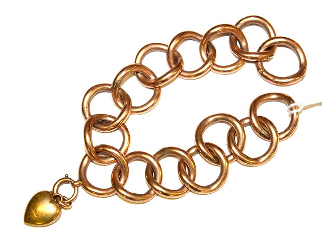 Appraisal: A CT GOLD HOLLOW LINK CURB CHAIN BRACELET with attached