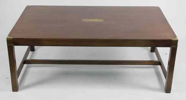 Appraisal: A teak coffee table with brass mounted corners on square