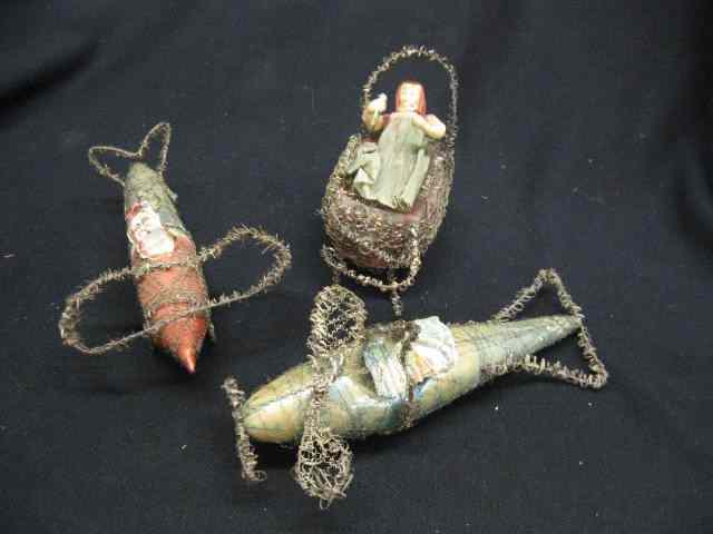 Appraisal: Victorian Blown Glass Tinsel ChristmasOrnaments santa in sled airplanes longest