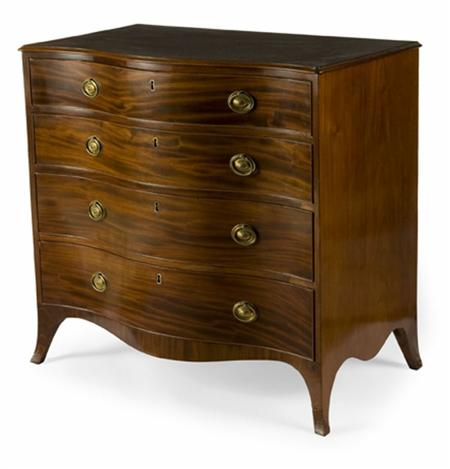 Appraisal: A George III mahogany serpentine chest with ogee moulded top