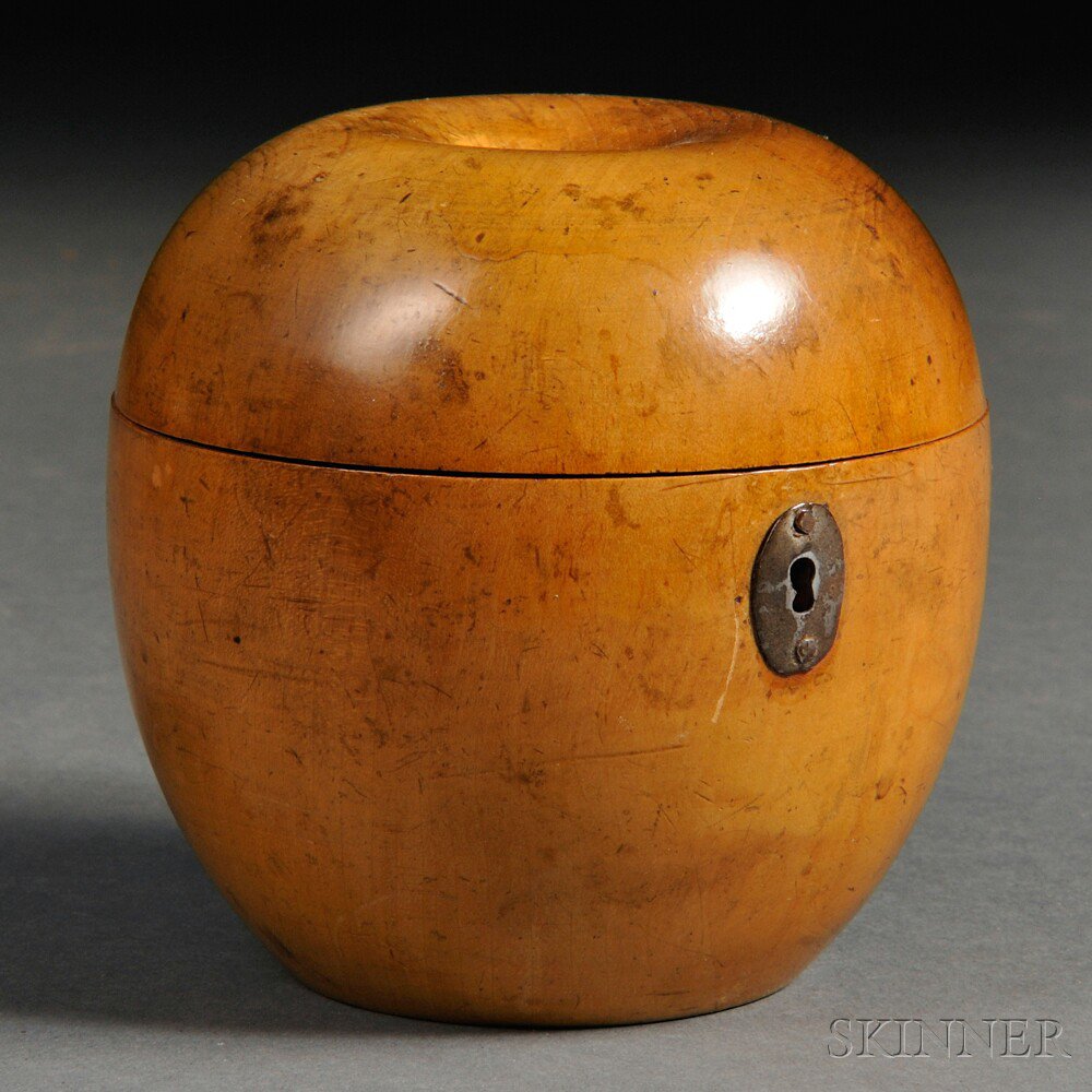 Appraisal: Fruitwood Apple-form Tea Caddy England late th century with oval