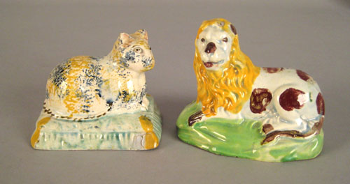 Appraisal: Two Staffordshire miniature figures ca one a recumbent lion the