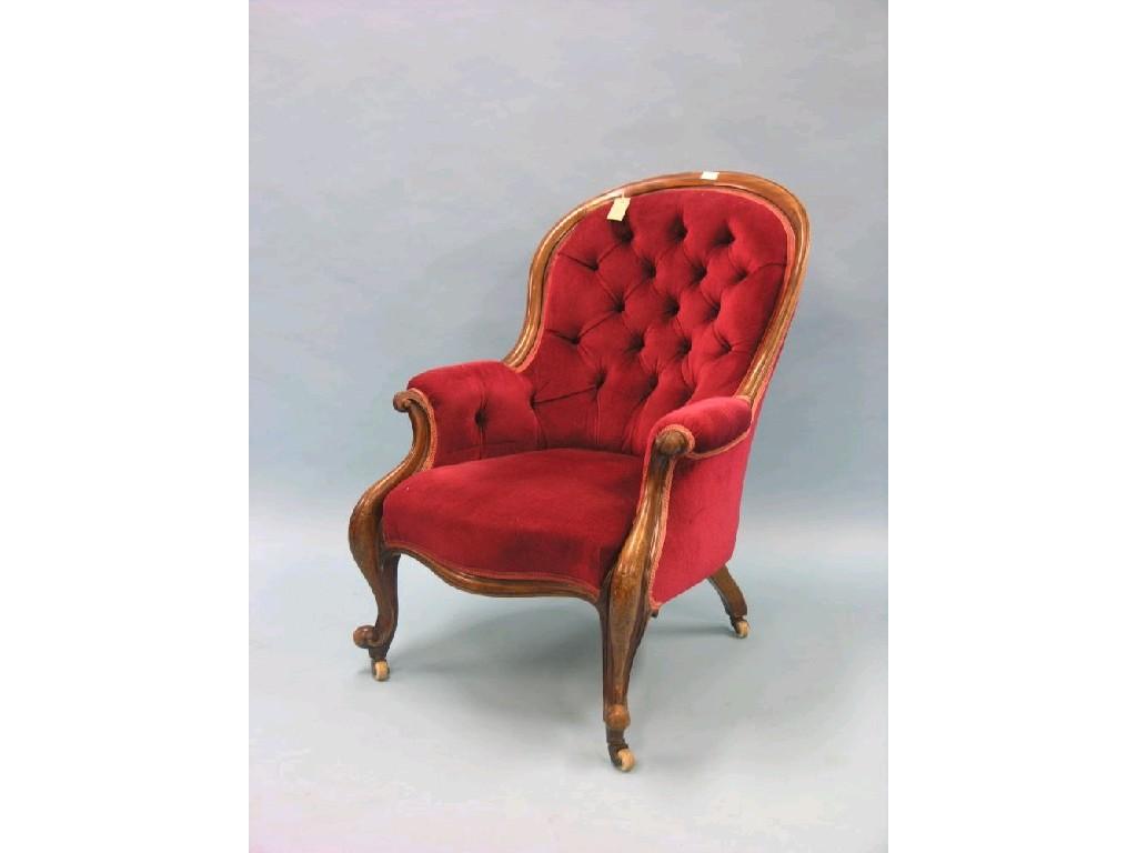 Appraisal: A Victorian mahogany drawing room armchair spoon-back upholstered in a