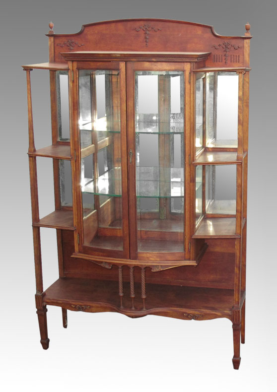 Appraisal: EDWARDIAN CURIO CABINET ETAGERE Shaped top with applied garland decoration