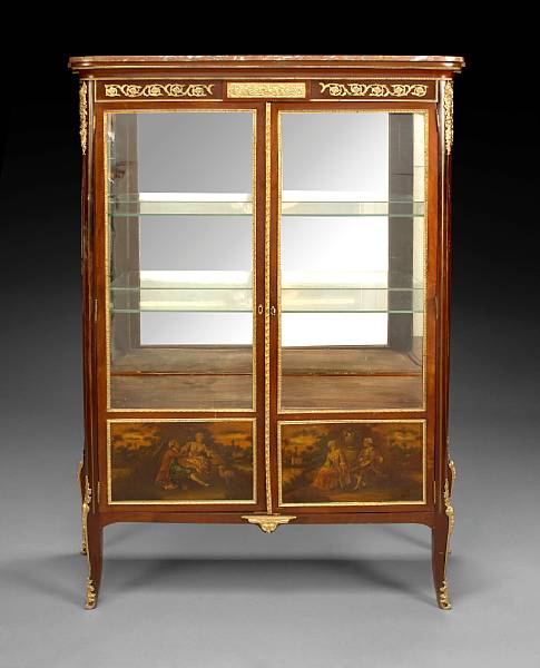 Appraisal: A Louis XV style gilt bronze mounted mahogany vitrine circa