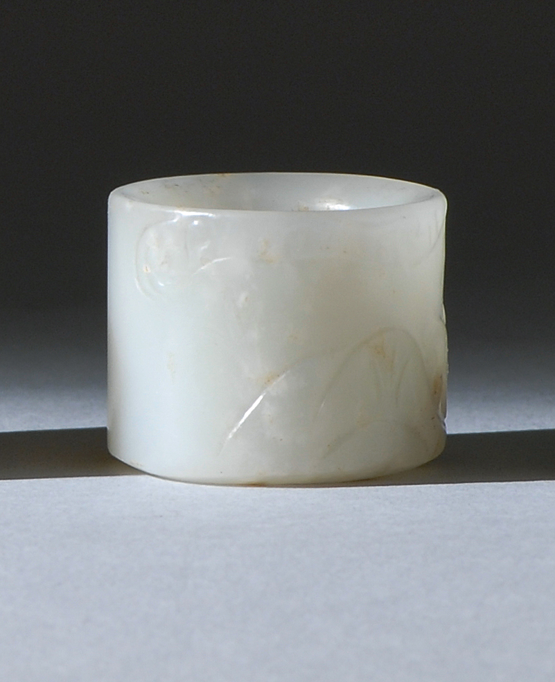 Appraisal: WHITE JADE SCHOLAR'S RING Early th CenturyIn cylinder form with