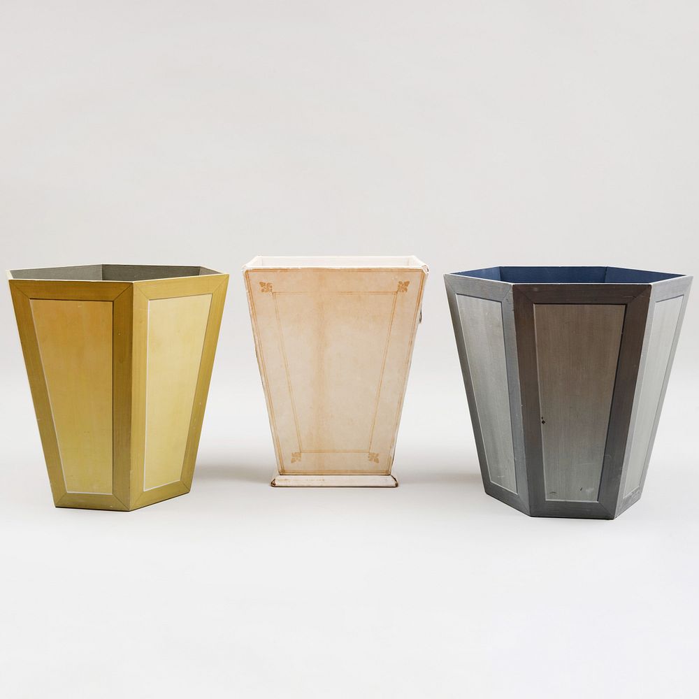 Appraisal: Three Painted Waste Paper Baskets Comprising A rectangular cream colored