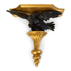 Appraisal: A Pair of Georgian Giltwood and Ebonized Carved Eagle Wall