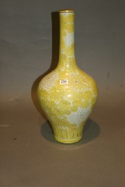 Appraisal: A yellow and white Chinese vase