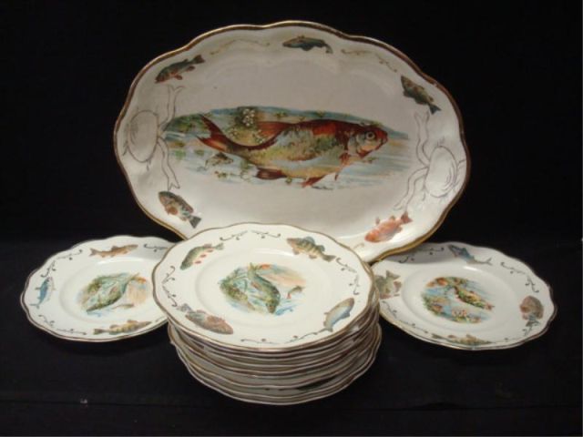 Appraisal: Fish platter w plates signed Edwin Knowles Platter x oval