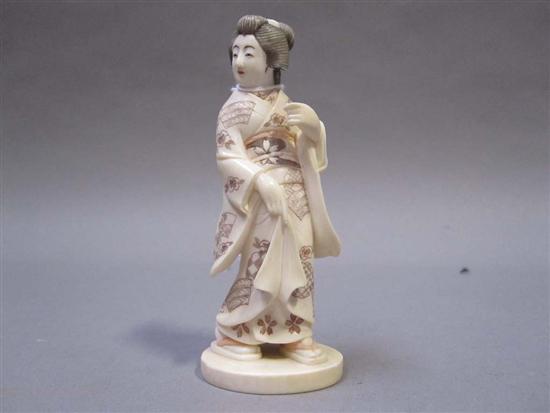 Appraisal: JAPANESE POLYCHROME DECORATED IVORY OKIMONO OF A GEISHA GIRL th