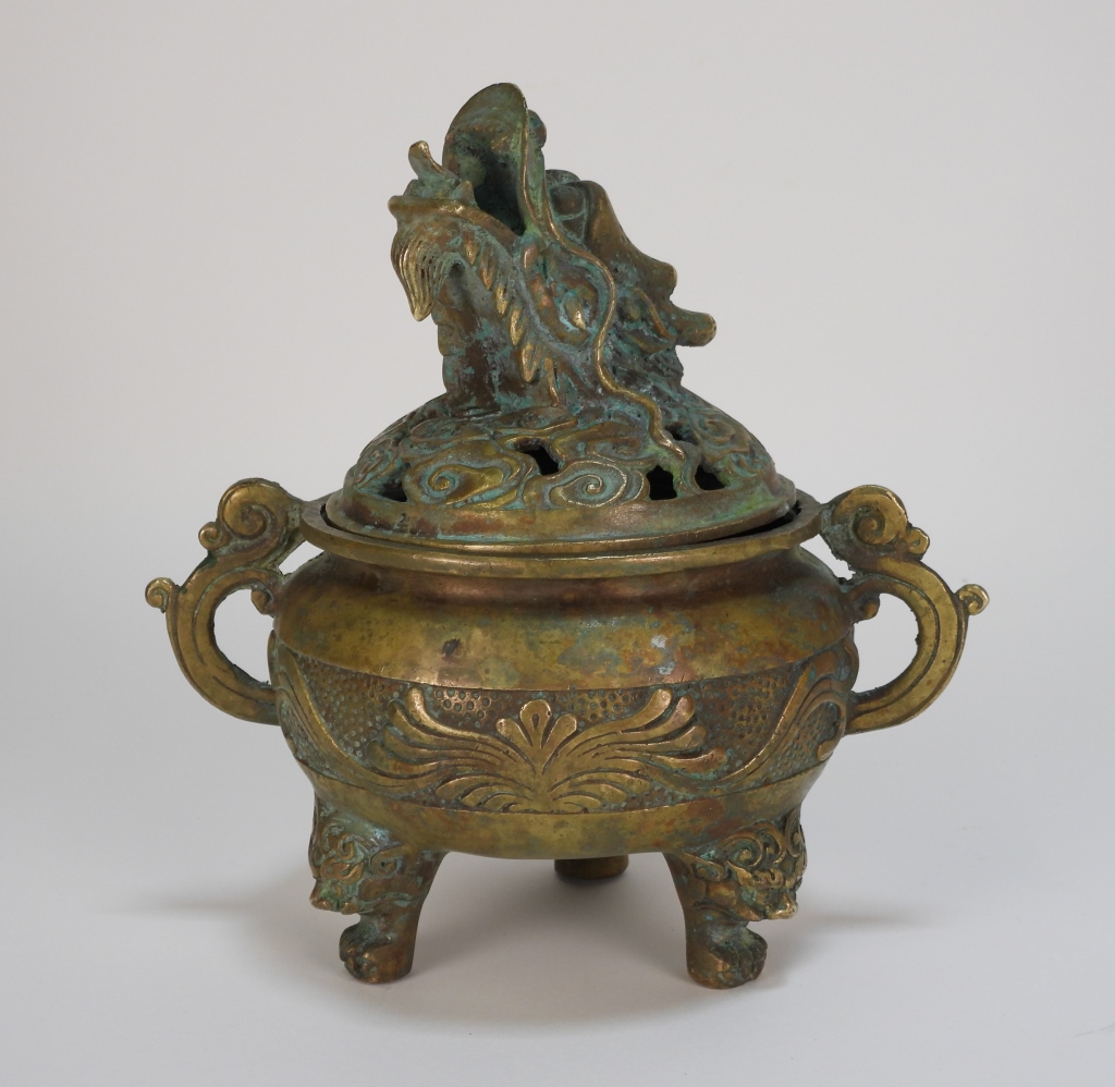 Appraisal: CHINESE BRASS DRAGON FOOTED CENSER China th CenturyFigural dragon head