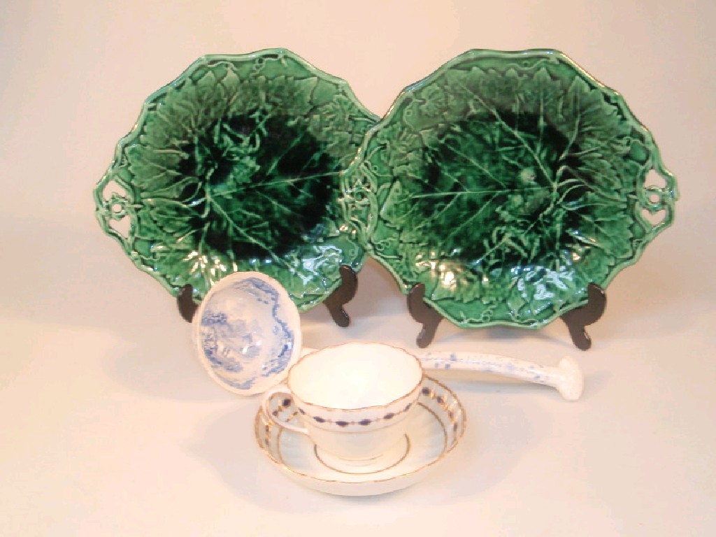 Appraisal: A pair of Davenport green glazed leaf moulded dishes with