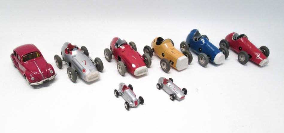 Appraisal: COLLECTION OF EIGHT SCHUCO TOY CARS including clock works Micro