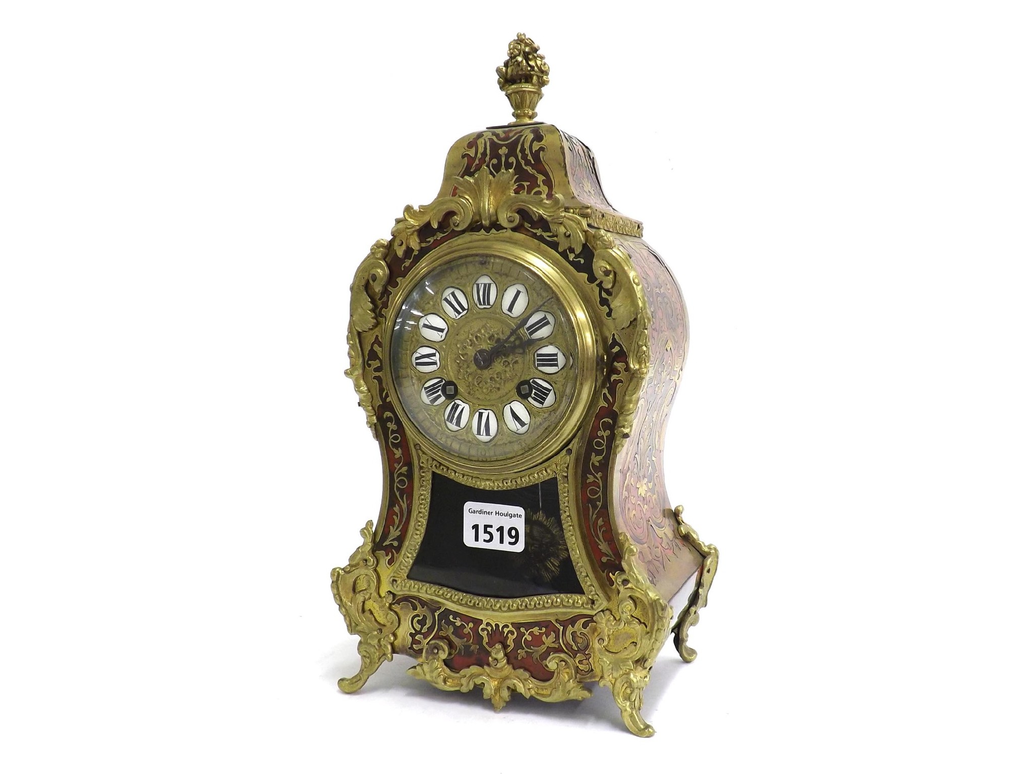 Appraisal: French boulle two train balloon mantel clock striking on a