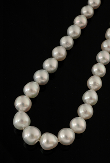 Appraisal: A strand of South Sea pearls Comprising thirty three off