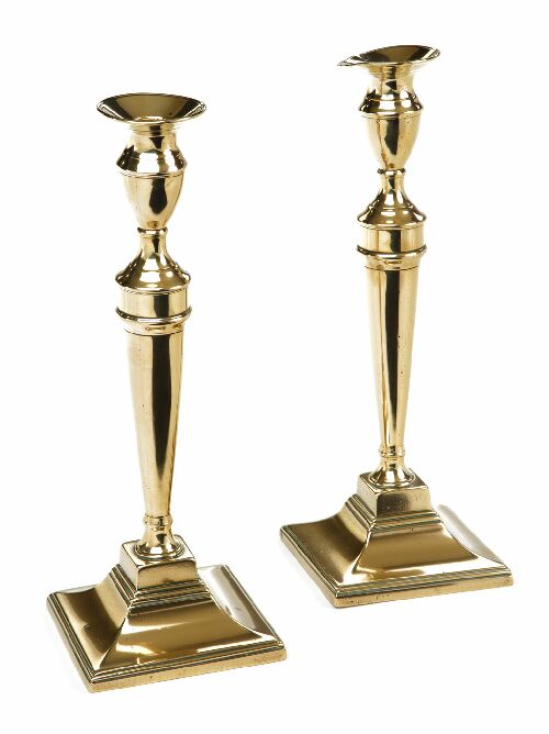 Appraisal: A pair of late th century brass table candlesticks each