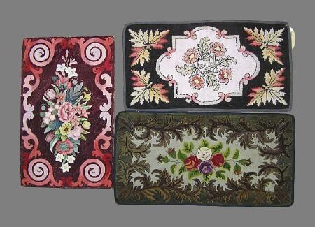 Appraisal: THREE AMERICAN HOOKED RUGS The one with floral sprays on