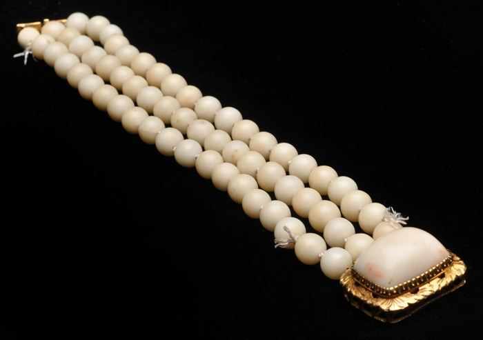 Appraisal: THREE STRAND WHITE CORAL BRACELET AND GOLD WHITE CORAL EARRINGS