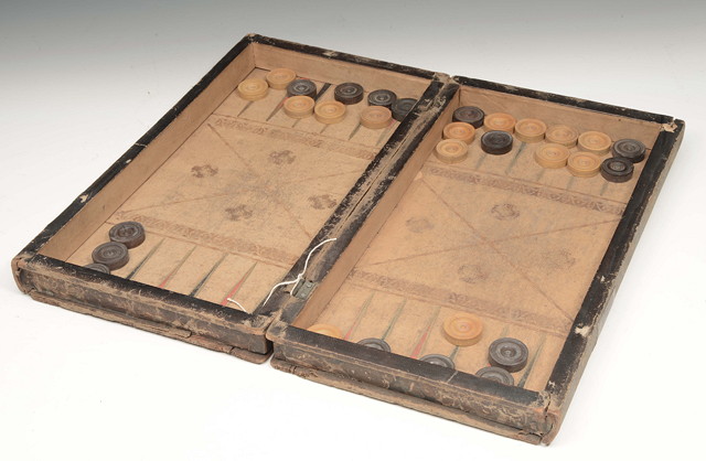 Appraisal: A LATE TH CENTURY LEATHER BOUND FAUX BOOK GAMES COMPENDIUM