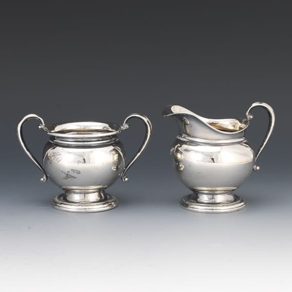 Appraisal: INTERNATIONAL STERLING CREAMER AND SUGAR International Sterling Courtship pattern creamer