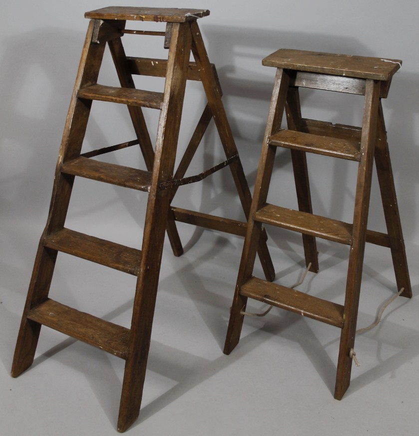 Appraisal: A rustic elm folding stepladder with metal mounts hinging at