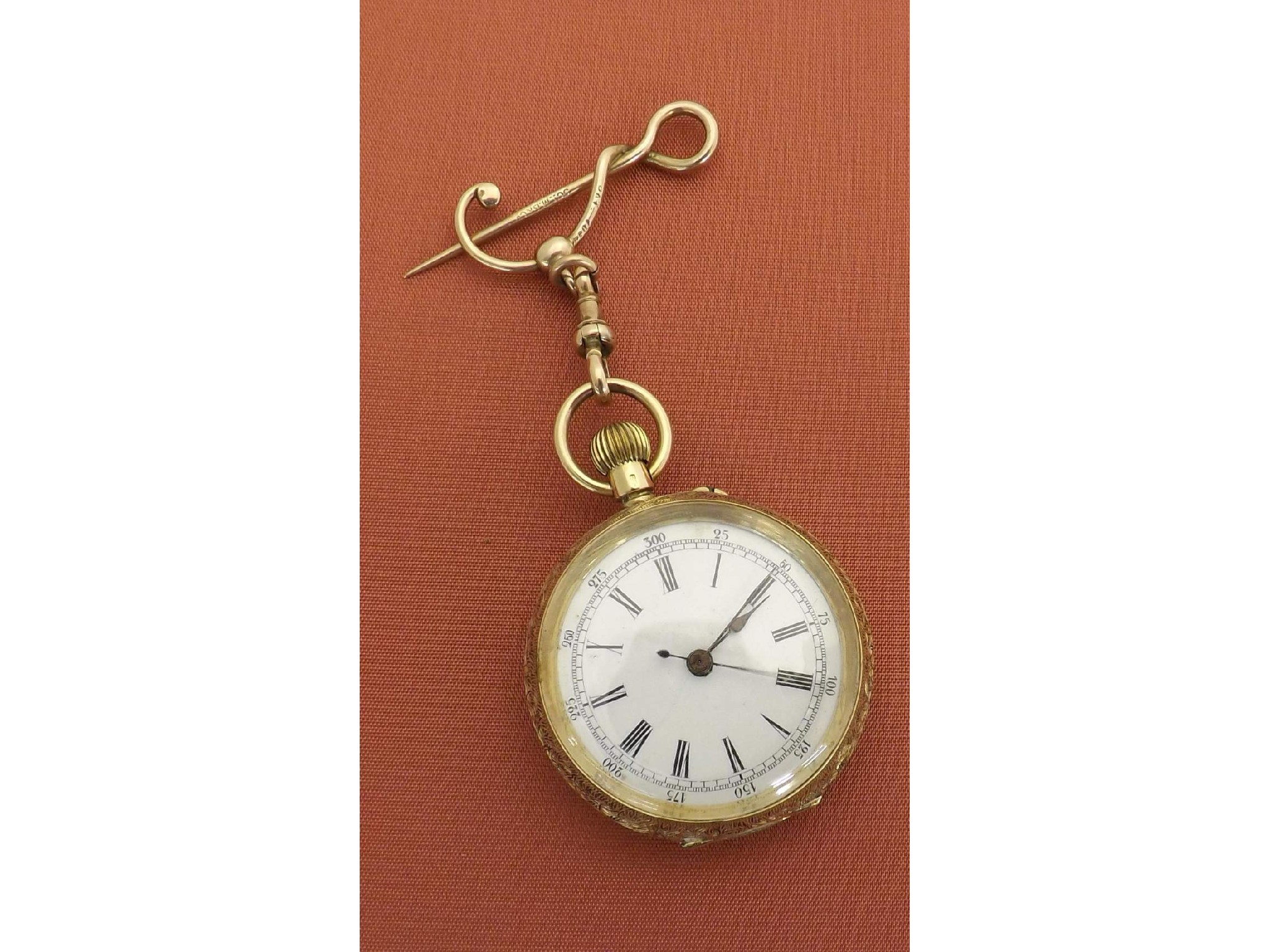 Appraisal: k cylinder engraved fob watch with centre seconds on a