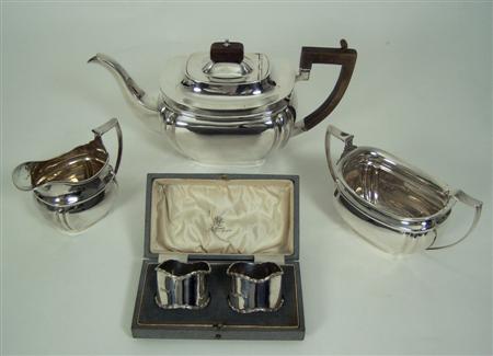 Appraisal: A silver three piece tea service Martin Hall Co Birmingham