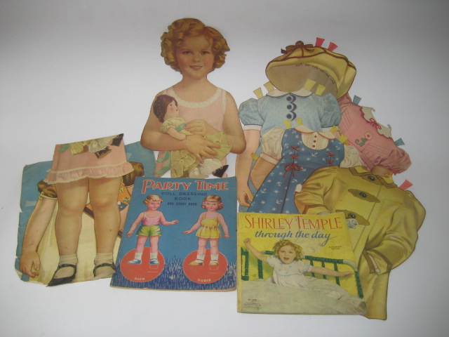 Appraisal: A Shirley Temple card cut out doll with two printed