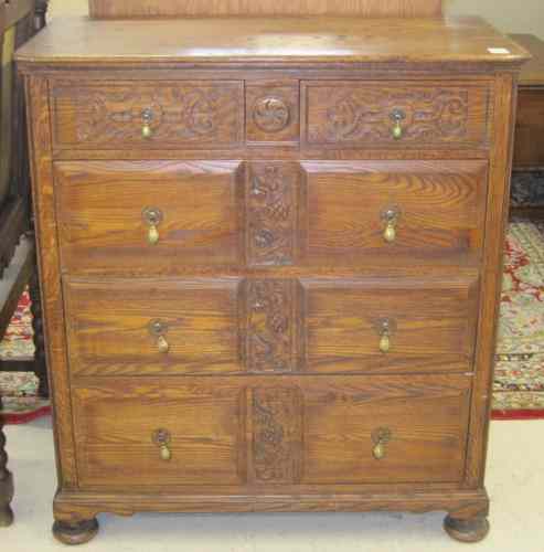 Appraisal: CARVED FEUDAL OAK CHEST OF DRAWERS Jamestown Lounge Co for