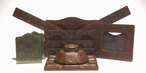 Appraisal: TIFFANY STUDIOS Seven desk-set items in the Zodiac pattern Inwell