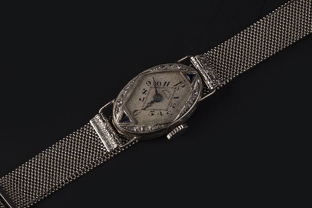 Appraisal: A LADY'S DIAMOND AND GEM SET COCKTAIL WATCH BY BOREL