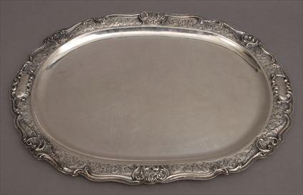 Appraisal: CONTINENTAL ROCOCO-STYLE SILVER OVAL TRAY With rubbed poincons the scalloped