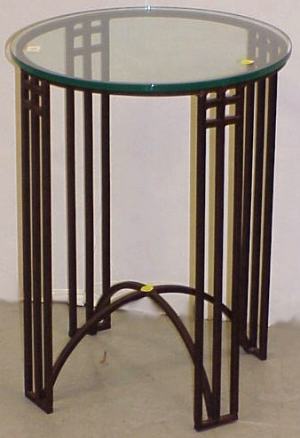 Appraisal: Glass top metal stand round top contemporary mission style base