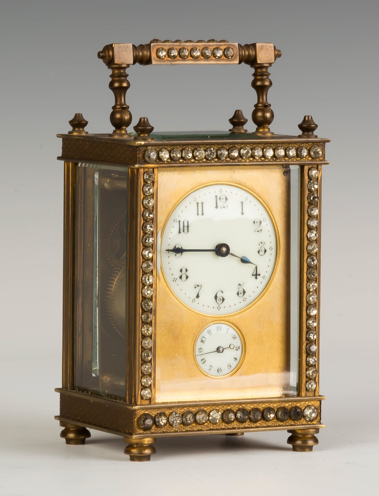 Appraisal: French Carriage Clock with Rhinestones Brass case with beveled glass