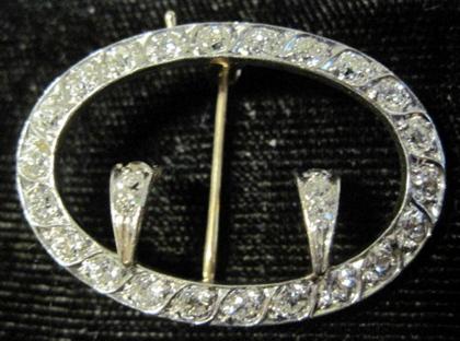 Appraisal: Platinum topped yellow gold and diamond 'buckle' pinDisplays twenty-eight petite