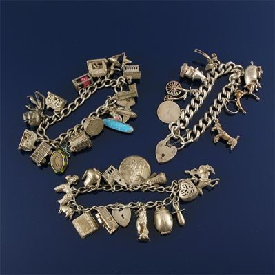 Appraisal: Three silver bracelets each with several silver and metal charms