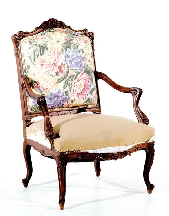 Appraisal: Louis XV style carved walnut armchair late th century cartouche-form