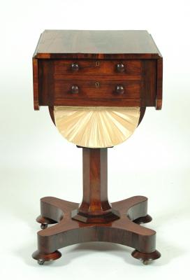 Appraisal: A ROSEWOOD WORK TABLE early th century of rounded oblong