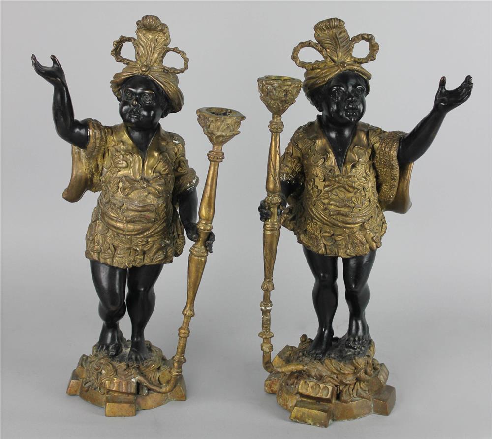 Appraisal: PAIR OF CONTINENTAL PARCEL GILDED BLACKAMOORS the cherubic figures dressed