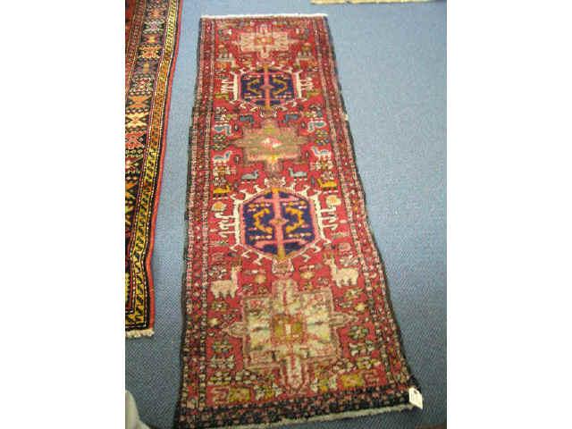 Appraisal: Heriz Persian Handmade Rug geometric medallions on red field '