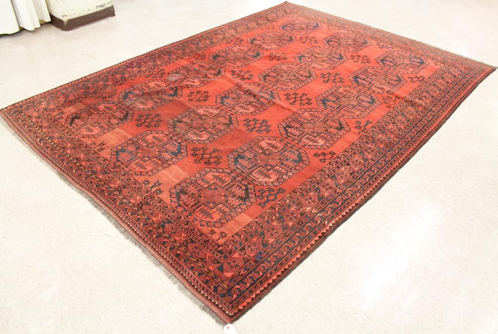 Appraisal: HAND KNOTTED AFGHAN ERSARI CARPET repeating octagonal medallion design on