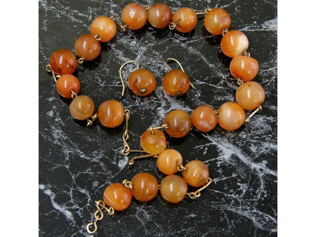 Appraisal: Agate yellow gold bead necklet long together with a pair