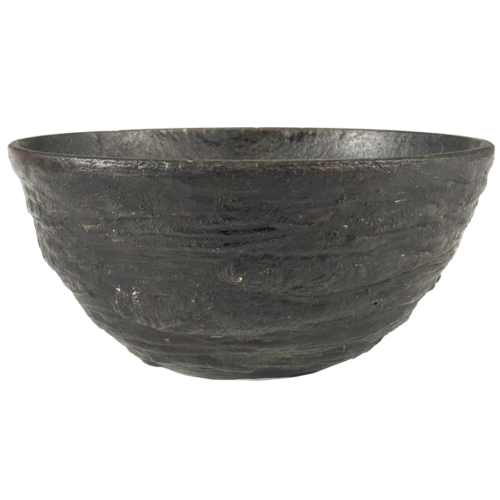 Appraisal: E T Hurley bowl in bronze withsubtle fish motif rounded