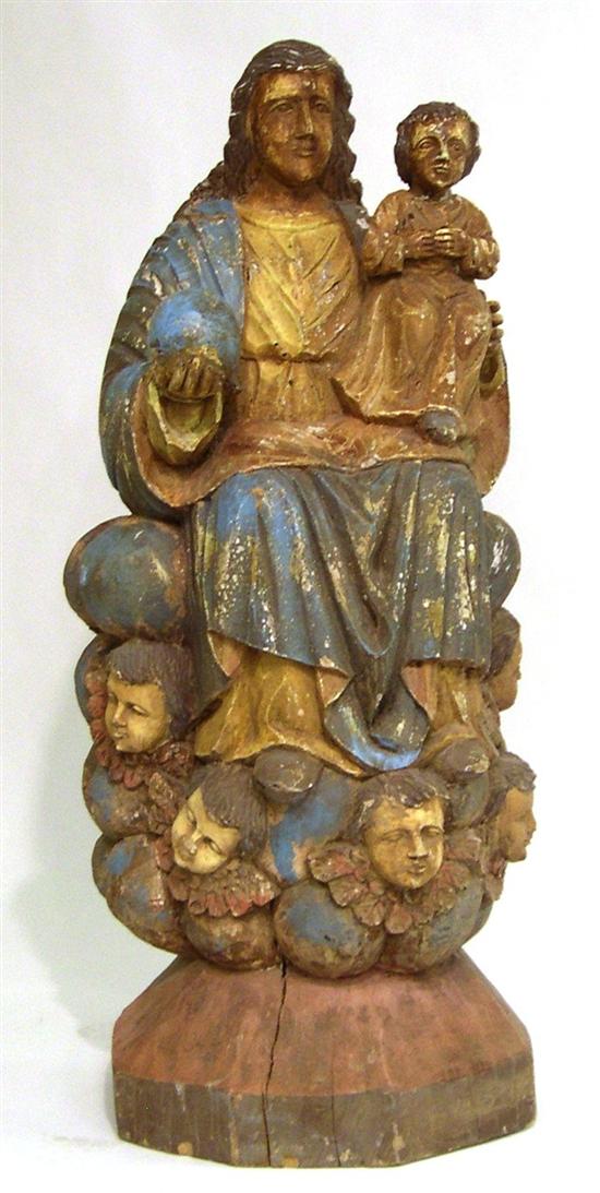 Appraisal: Carved wood Madonna holding Christ child and orb both figures