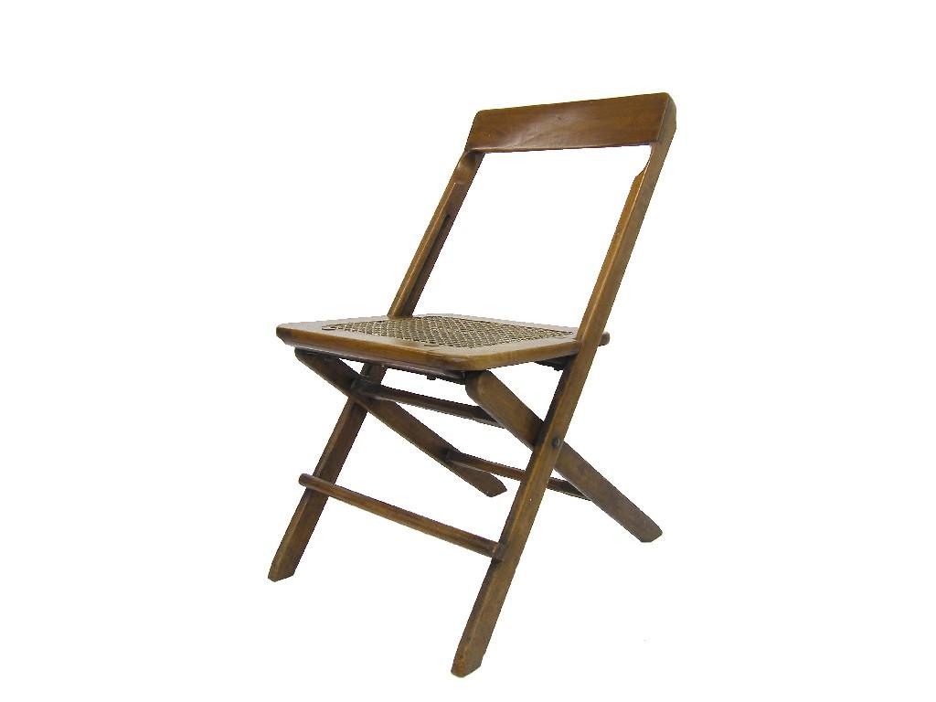 Appraisal: Folding teak campaign chair with cane seat indistinctly branded and