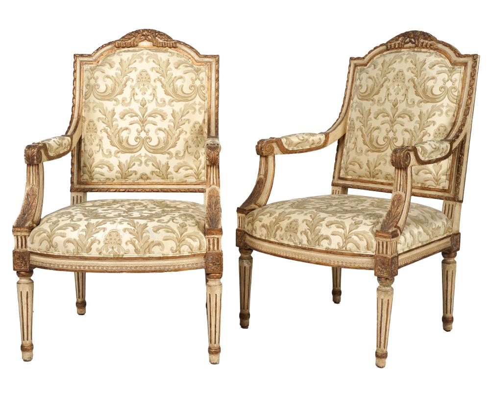 Appraisal: PAIR OF LOUIS XVI-STYLE CREAM GILT PAINTED FAUTEUILSmodern covered with